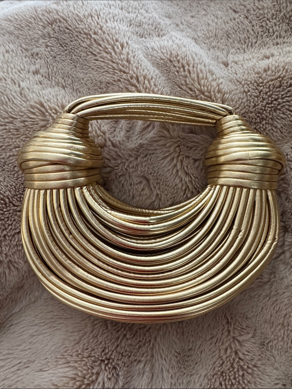 Gold clutch